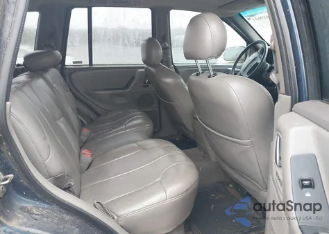 2000 Jeep Grand Cherokee Laredo из США, поврежденный, VIN 1J4GW48S7YC247210